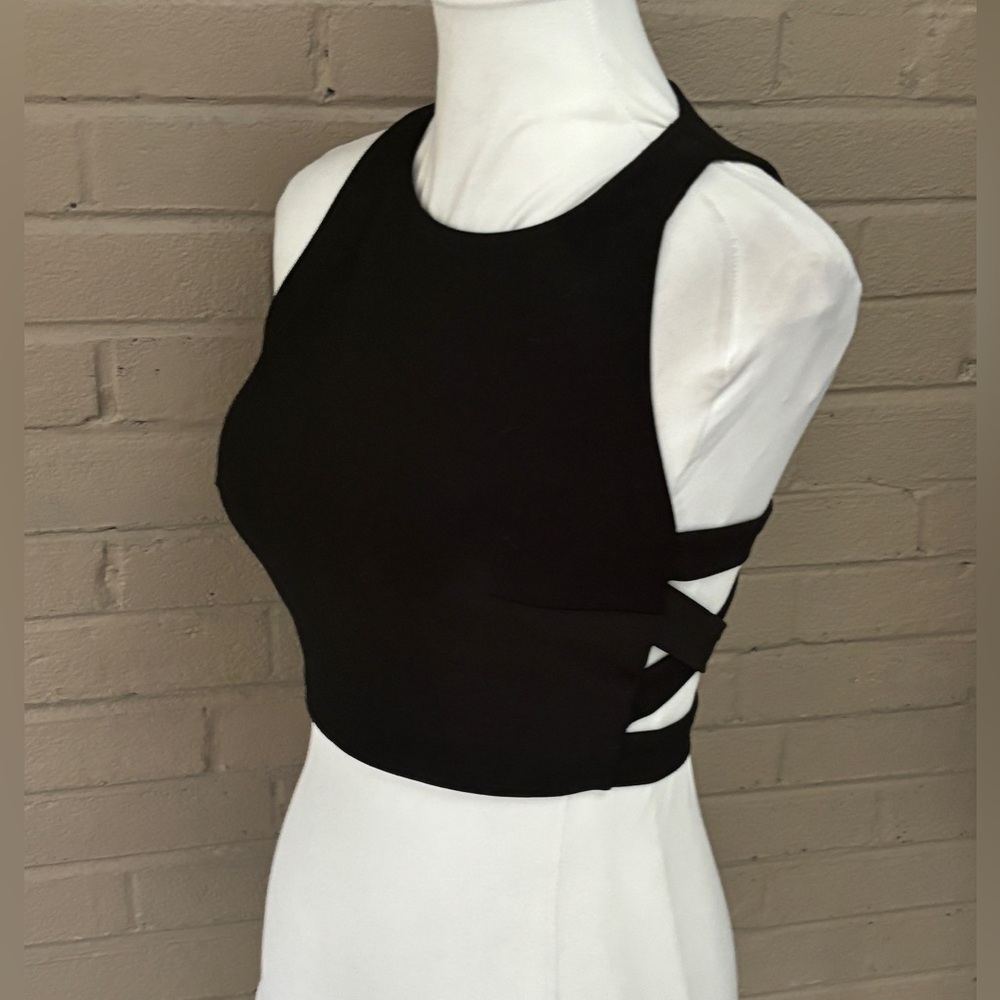 Blondie nites black strapy cut/ out crop top